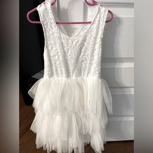 Flower girl dress with big bow on back.